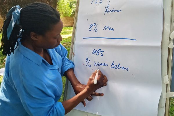 Dr Atuki delivering a training at MIFUMI Tororo office